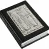 sterling silver bible with ornate detail and black cover