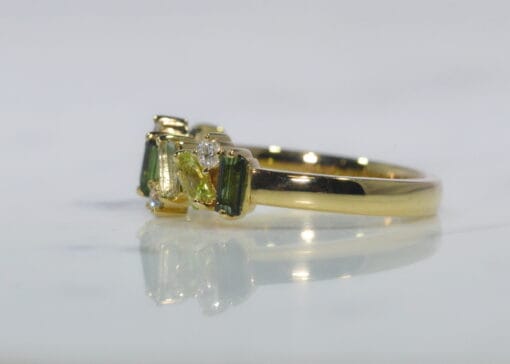 side view of Tourmaline, Amethyst, Peridot and Diamond Half Eternity Ring