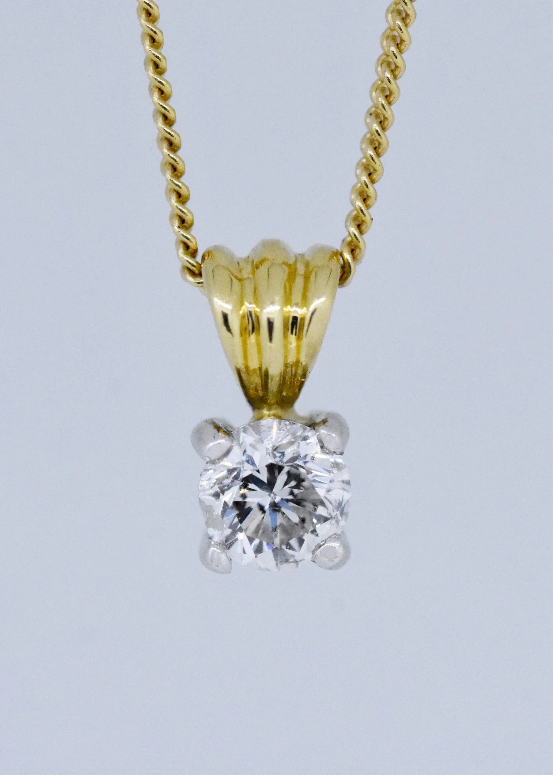 Solitaire Diamond Pendant with 16 inch Chain