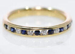 sapphire and diamond half eternity ring