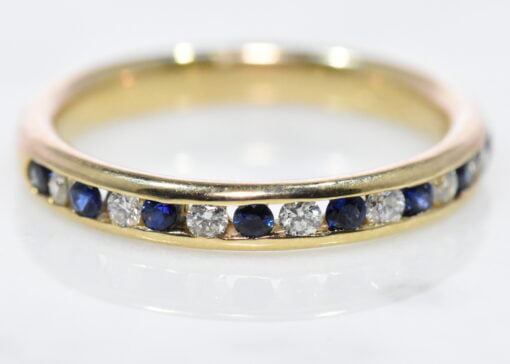 sapphire and diamond half eternity ring
