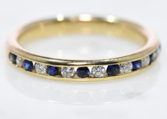 sapphire and diamond half eternity ring