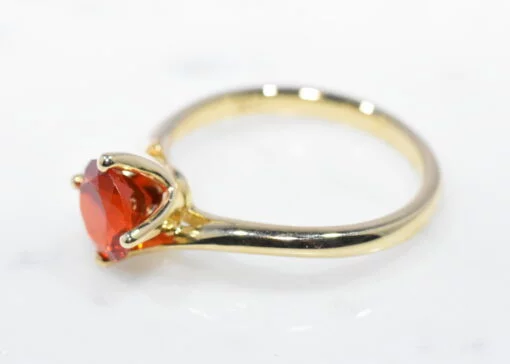 Single Stone Cross Over Fire Opal Ring - Image 2