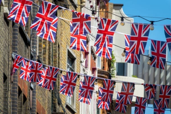 Union Jack flags flying in the street to mark VE day