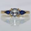 three stone yellow gold sapphire ring
