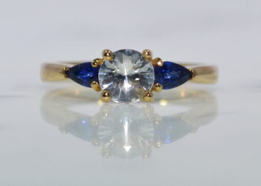 three stone yellow gold sapphire ring