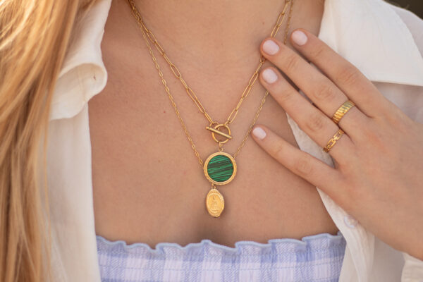 young woman wearing gold jewellery