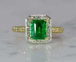 emerald and diamond cluster ring