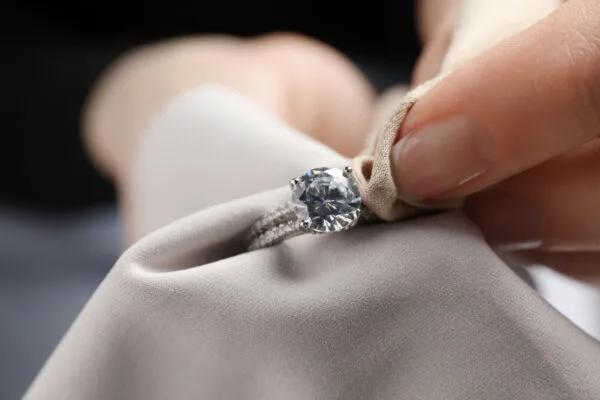 ring being cleaned with jewellery cleaning cloth